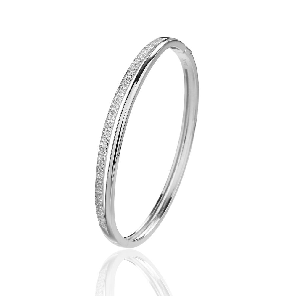 Stříbrný pevný náramek se zirkony